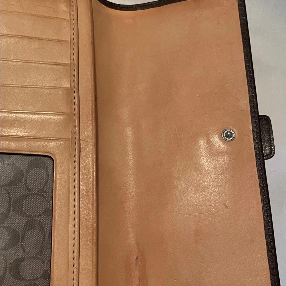 Coach triple wallet. EUC few call outs on inside.